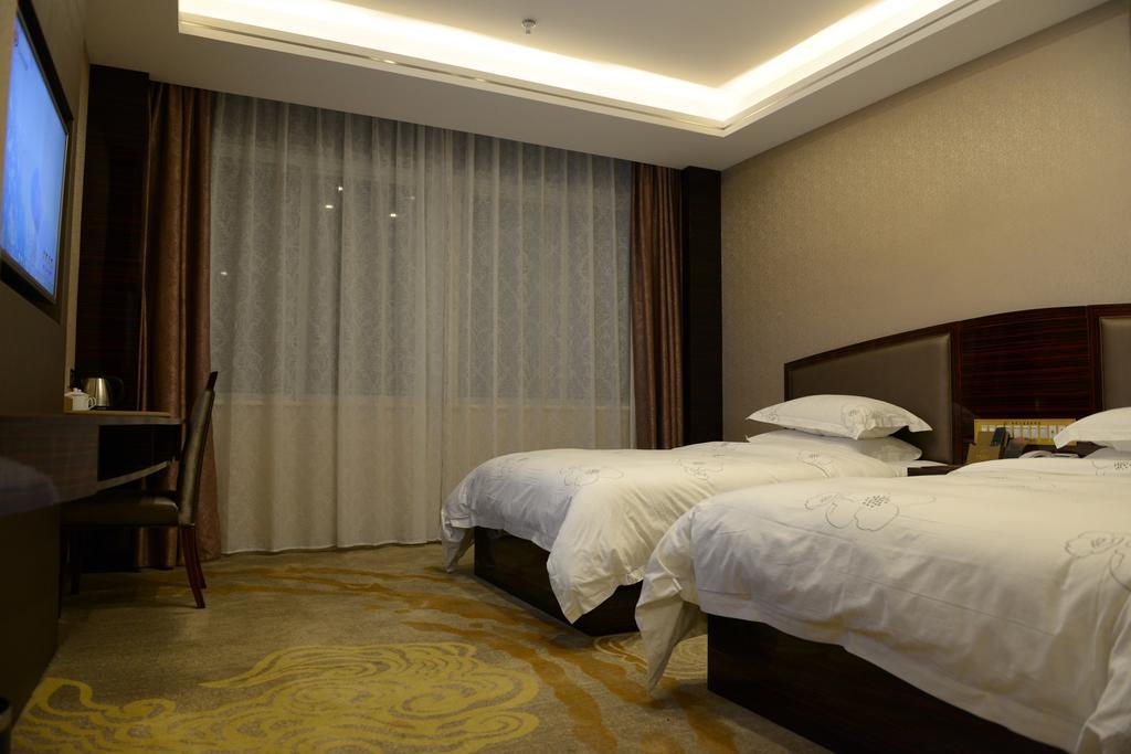 Tie Cheng Hotel Kuangcsou Szoba fotó
