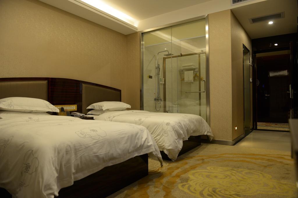 Tie Cheng Hotel Kuangcsou Szoba fotó