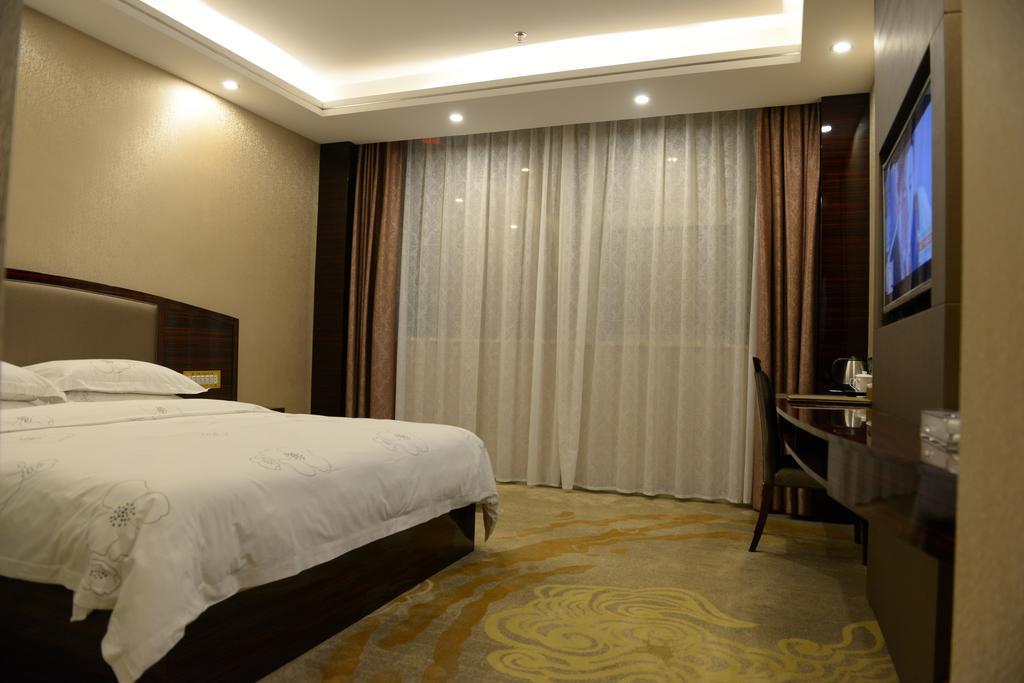 Tie Cheng Hotel Kuangcsou Szoba fotó